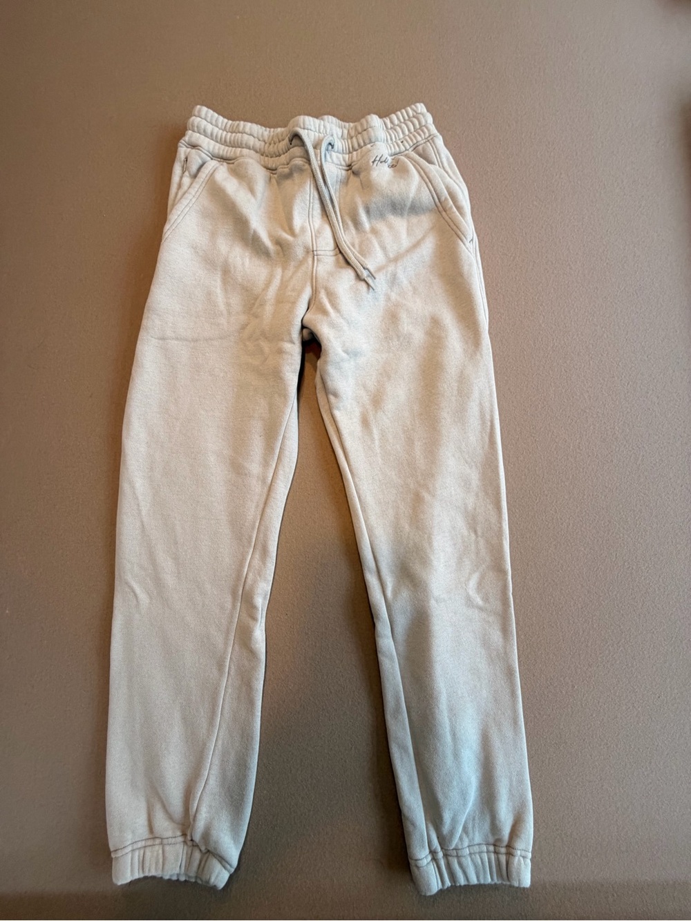 Hollister Jogger Sweatpants, fleece lined, waist tie and cinched bottoms. NWOT